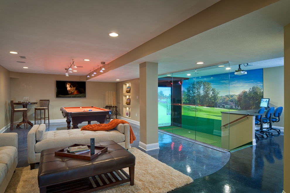 Exempel på en stor modern källare utan fönster, med ett spelrum, betonggolv och flerfärgat golv