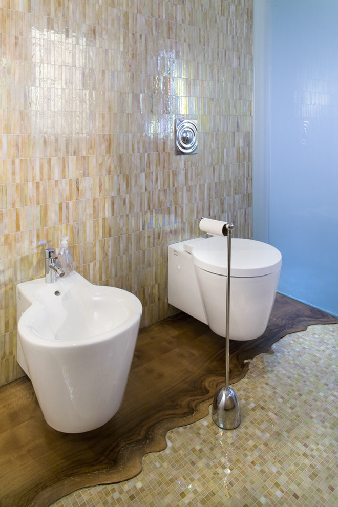 This is an example of a contemporary bathroom in San Francisco with brown tile.