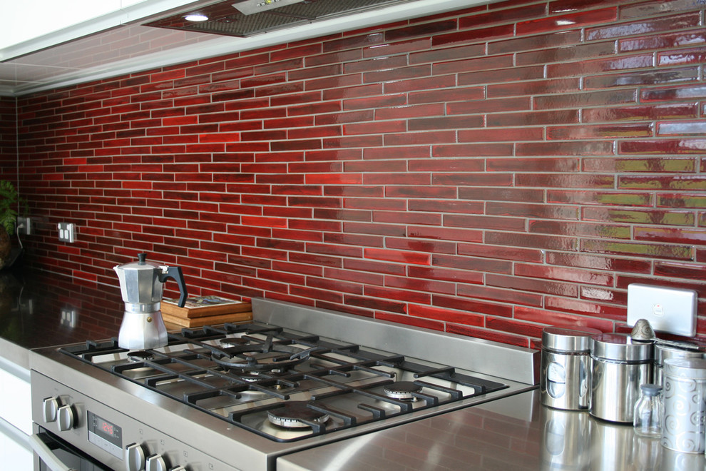 Design ideas for a mediterranean kitchen in Brisbane with red splashback and mosaic tile splashback.