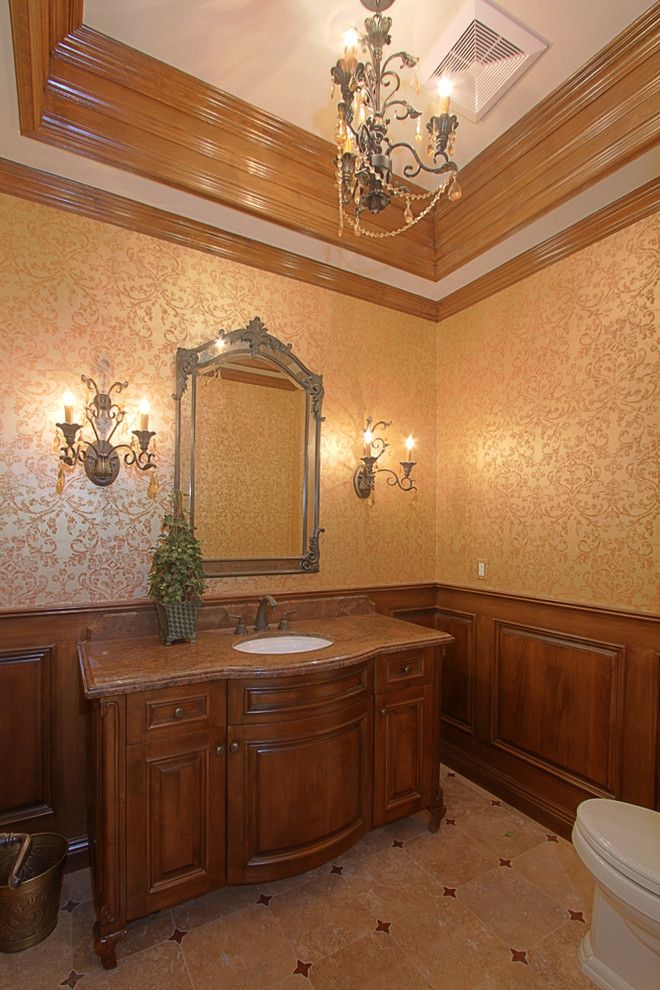 This is an example of a traditional powder room in Los Angeles.