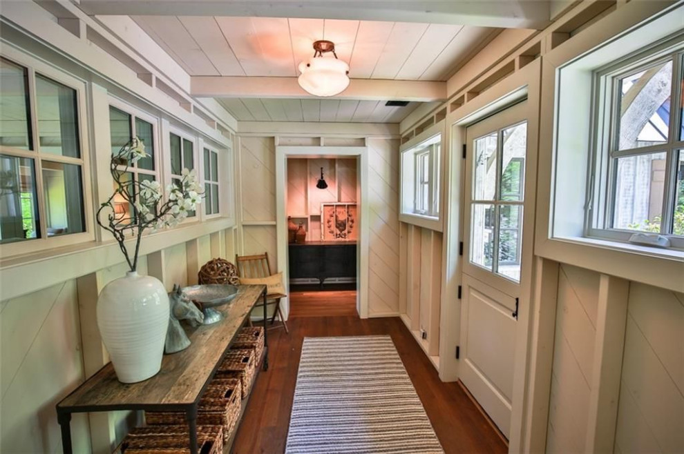 Design ideas for a mid-sized transitional entry hall in DC Metro with white walls, medium hardwood floors, a dutch front door, a gray front door, timber and planked wall panelling.