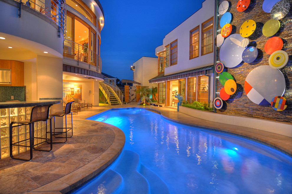 Inspiration for a contemporary courtyard pool in Orange County.