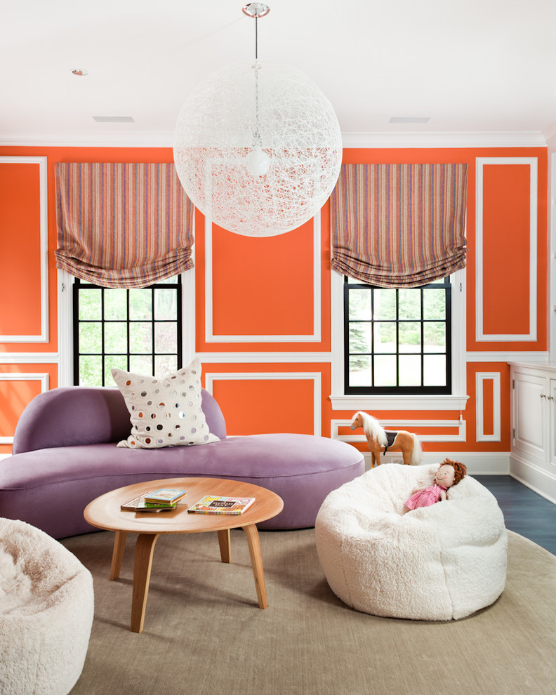 Transitional living room in New York with orange walls.