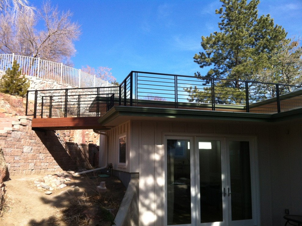 Large mountain style rooftop balcony deck photo in Denver with no cover