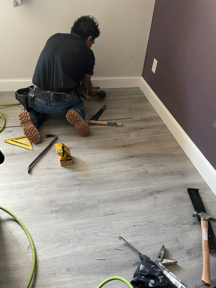 Install Vinyl Flooring & Demo kitchen tile / installed new tile