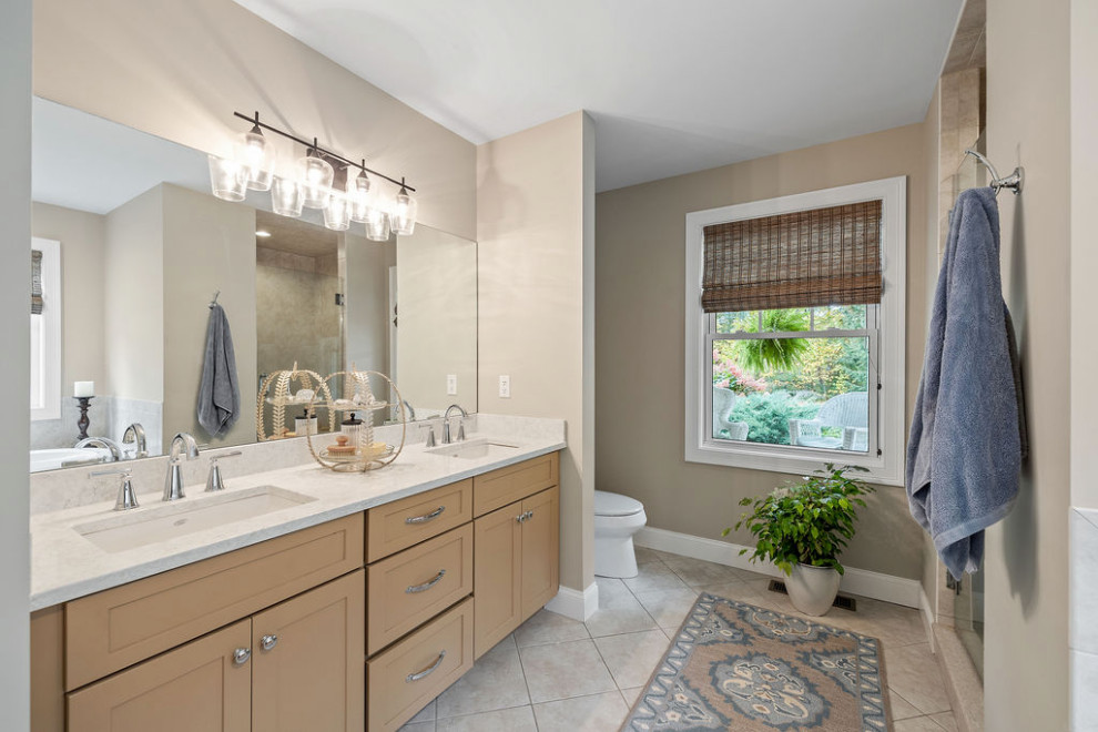 Inspiration for a transitional master bathroom in Boston with shaker cabinets, beige cabinets, an alcove shower, beige walls, porcelain floors, an undermount sink, onyx benchtops, beige floor, white benchtops, a double vanity and a built-in vanity.