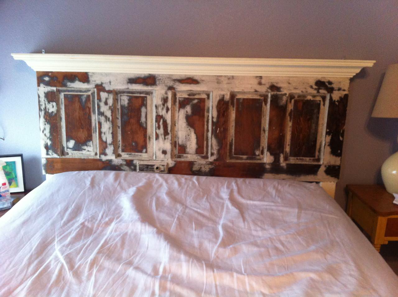 The item will be kept in its original packaging, and assembly is not included. old doors headboard houzz