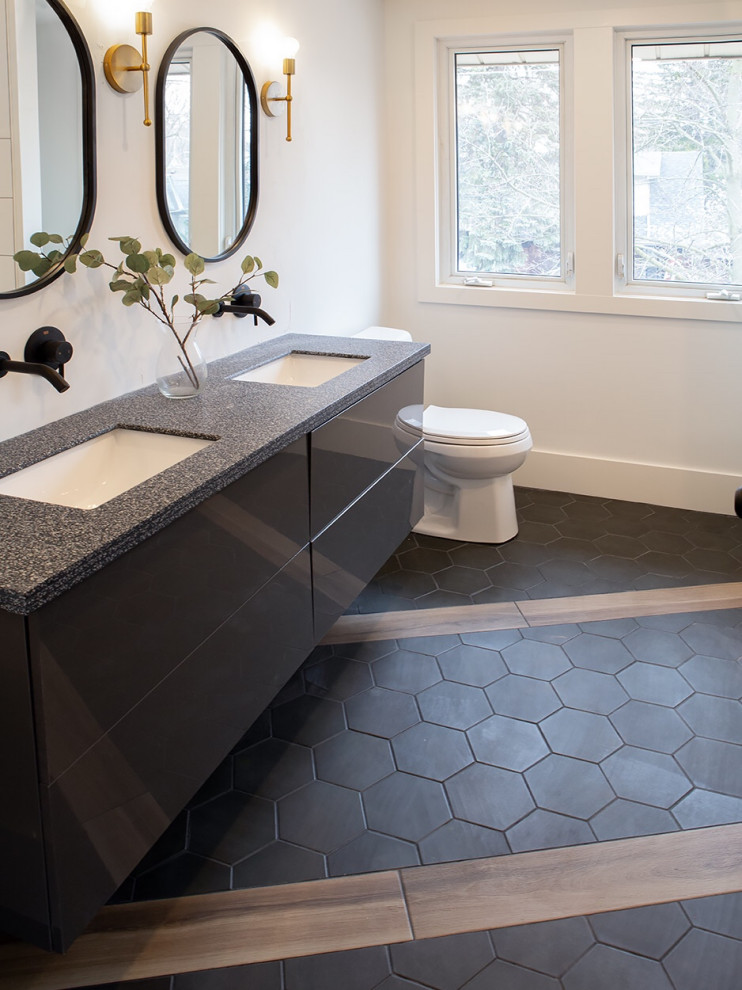 Mid-sized modern master bathroom with flat-panel cabinets, grey cabinets, an alcove tub, white tile, ceramic tile, white walls, ceramic floors, an undermount sink, terrazzo benchtops, black floor, black benchtops, a niche, a double vanity and a floating vanity.