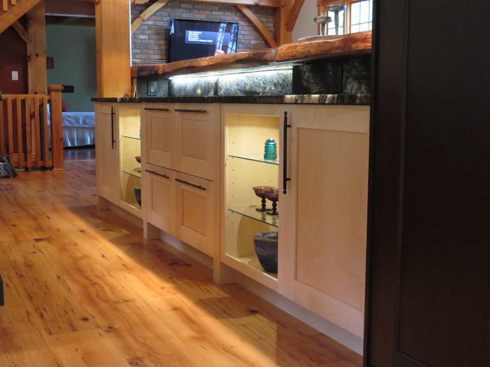 Large mountain style u-shaped light wood floor eat-in kitchen photo in Toronto with shaker cabinets, granite countertops, an island and light wood cabinets