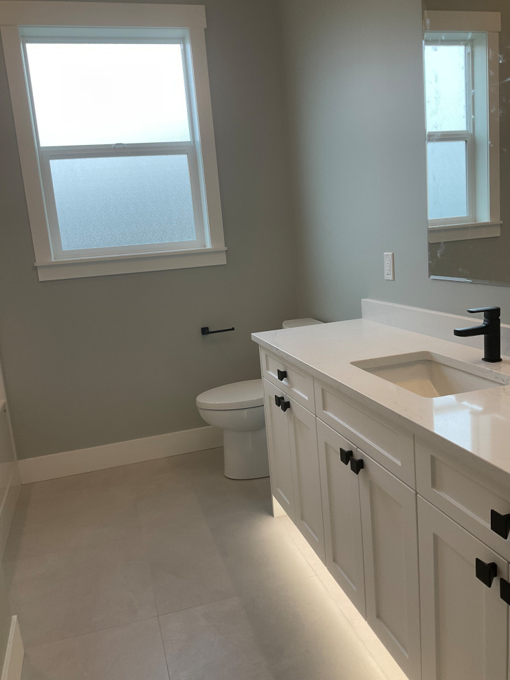 Clean white vanity cabinet installed in remodel project
