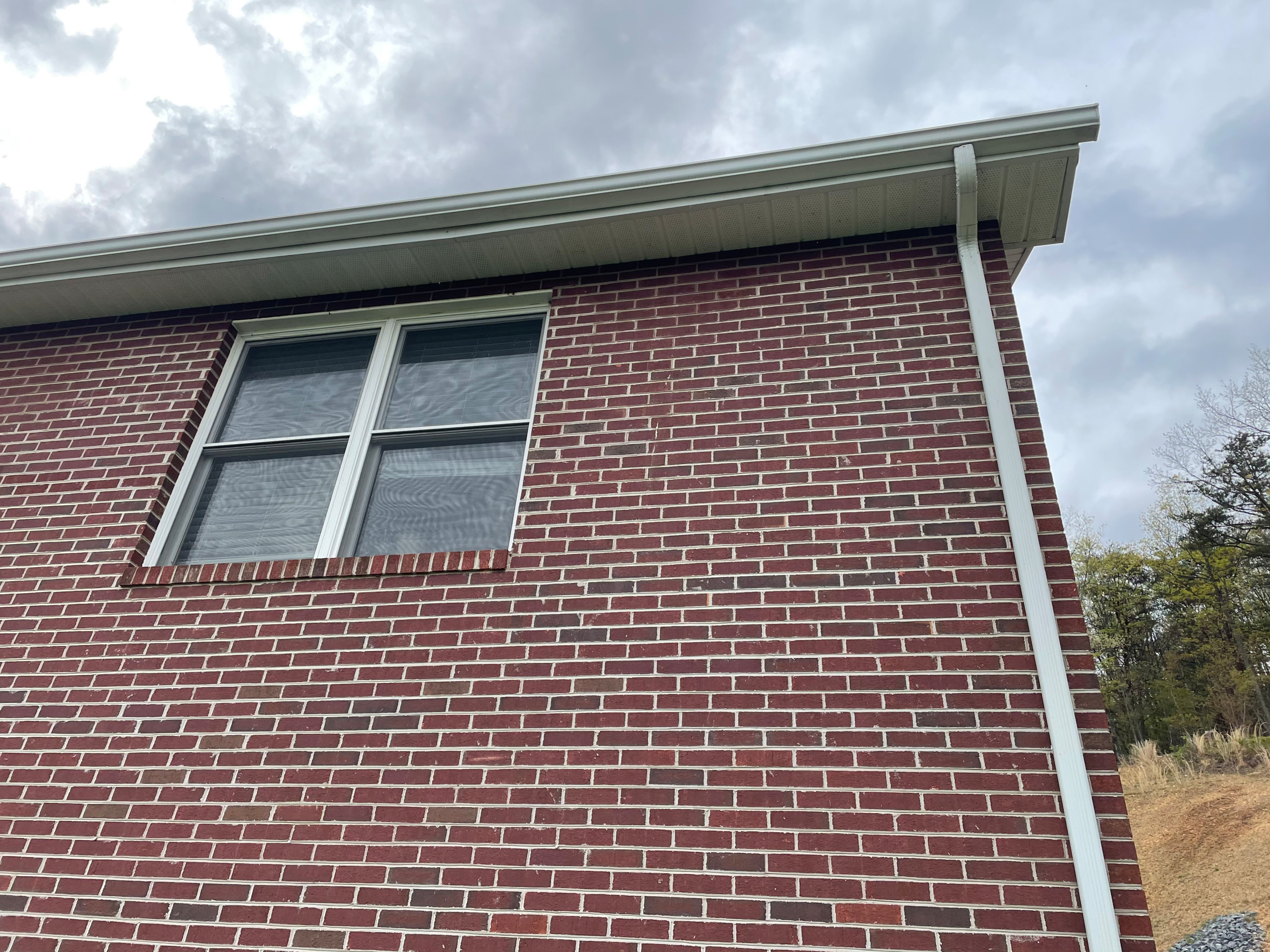 Deck stain and gutters powerwash