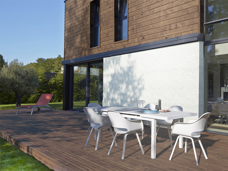 Design ideas for a mid-sized modern side yard deck in Lille with no cover.