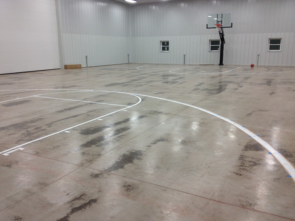 Design ideas for a large traditional indoor sport court in Columbus with grey walls, concrete floors and grey floor.