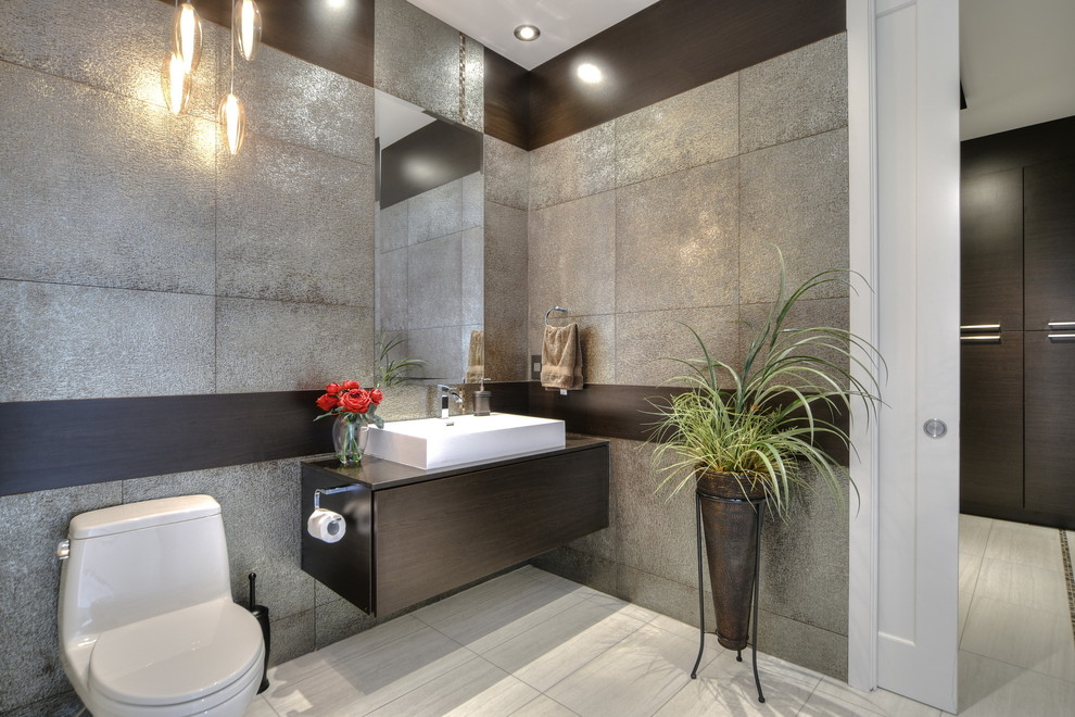 Inspiration for a large contemporary powder room in Montreal with flat-panel cabinets, dark wood cabinets, multi-coloured tile, ceramic tile, ceramic floors and quartzite benchtops.
