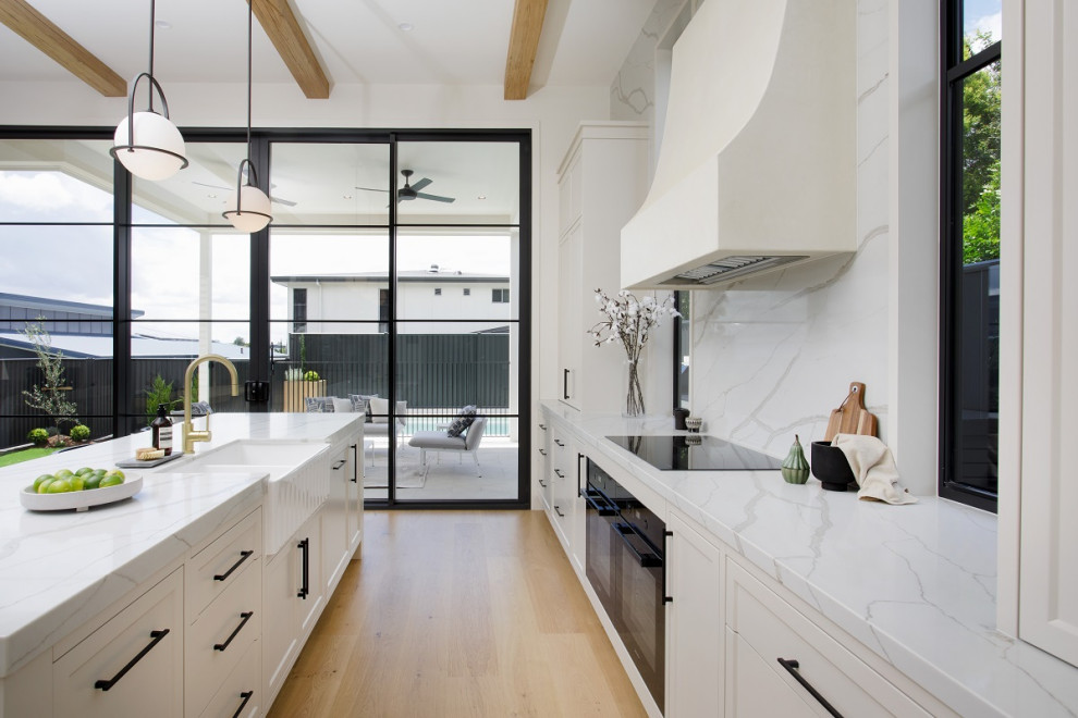 Large transitional kitchen in Sydney.