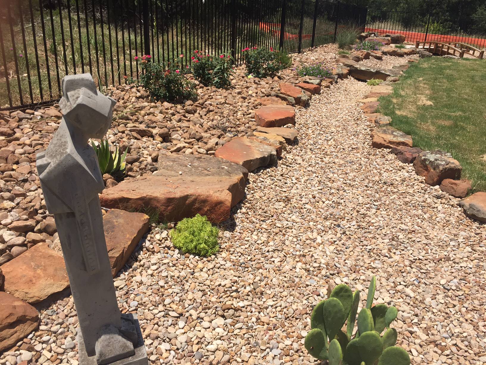 Xeriscape w/ dry creek bed for drainage
