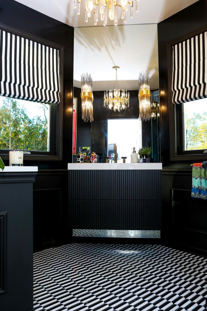 На фото: туалет в стиле фьюжн с черными фасадами, раздельным унитазом, черной плиткой, черными стенами, полом из мозаичной плитки, врезной раковиной, разноцветным полом, белой столешницей, подвесной тумбой и обоями на стенах