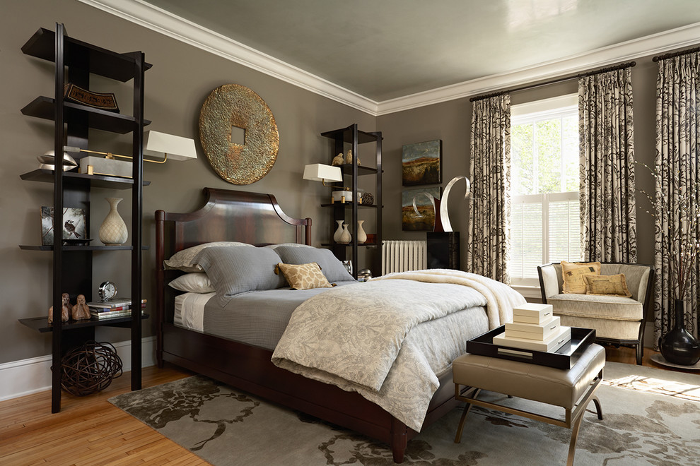 Inspiration for a transitional bedroom in Minneapolis with brown walls.