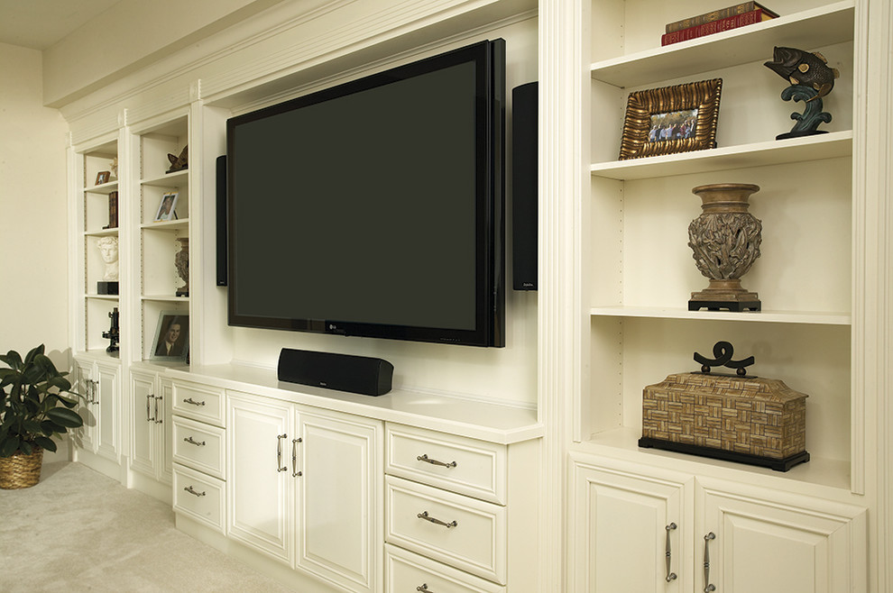 Photo of a mid-sized transitional open concept home theatre in Miami with a wall-mounted tv, white walls, carpet and white floor.