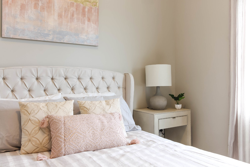 Example of a small eclectic guest carpeted and gray floor bedroom design in Seattle with gray walls