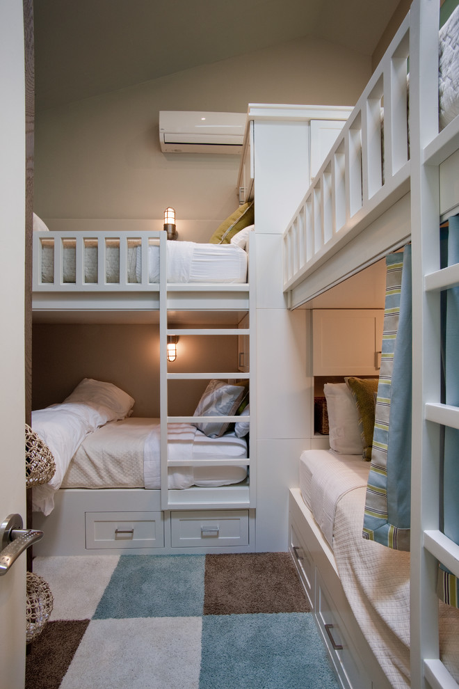 Example of a mid-sized beach style gender-neutral carpeted kids' room design in San Diego with gray walls