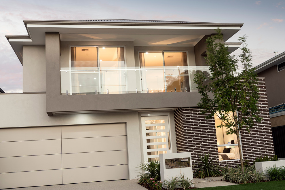 Design ideas for a large contemporary two-storey brick beige exterior in Perth with a hip roof.