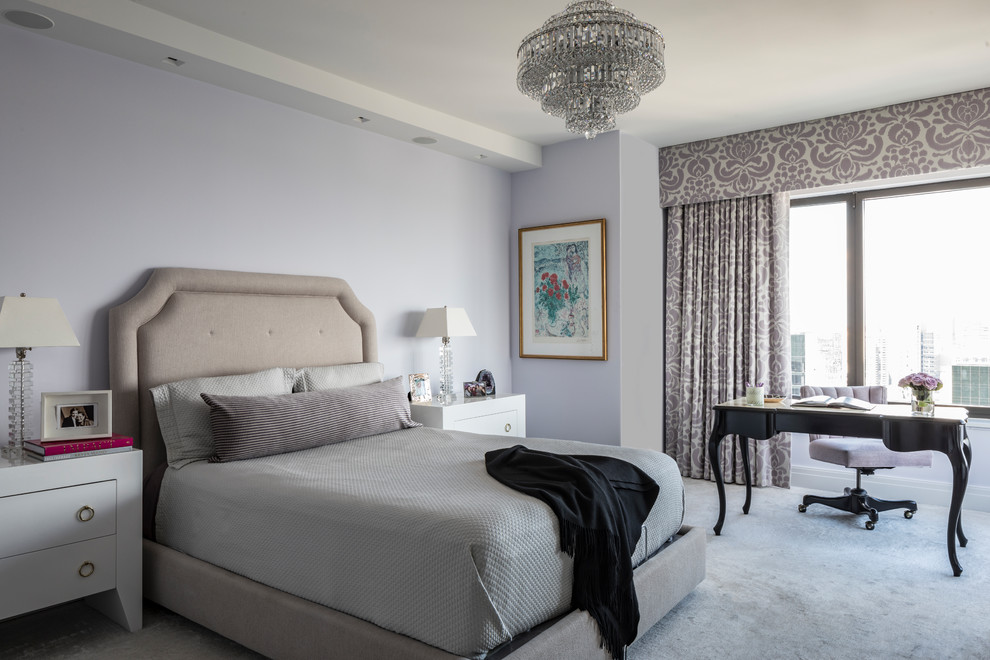 Design ideas for a transitional master bedroom in New York with purple walls and carpet.