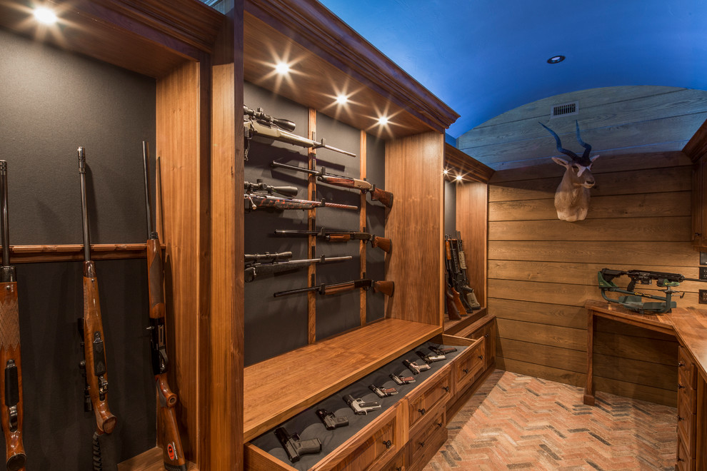 Inspiration for a rustic men's closet remodel in Austin