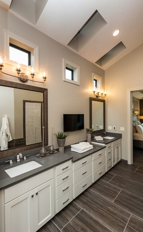 Large transitional master bathroom in Other with shaker cabinets, white cabinets, grey walls, porcelain floors, an undermount sink, engineered quartz benchtops, brown floor and grey benchtops.