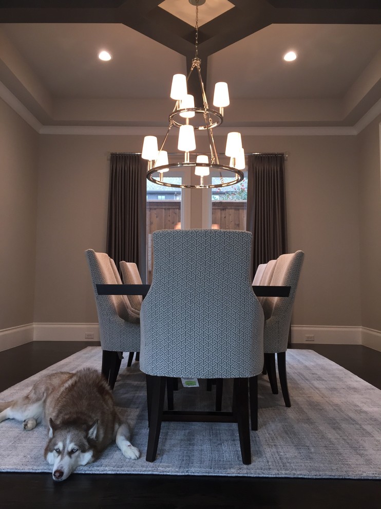 This is an example of a mid-sized transitional separate dining room in Dallas with grey walls, dark hardwood floors, no fireplace and brown floor.