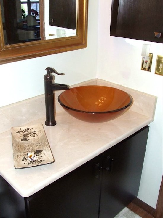Inspiration for a small asian 3/4 bathroom in Cleveland with a vessel sink and marble benchtops.