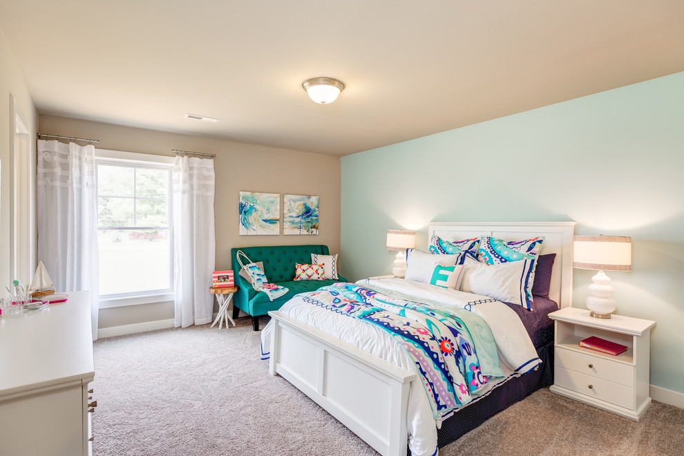 Inspiration for a mid-sized beach style kids' room for girls in Other with blue walls and carpet.