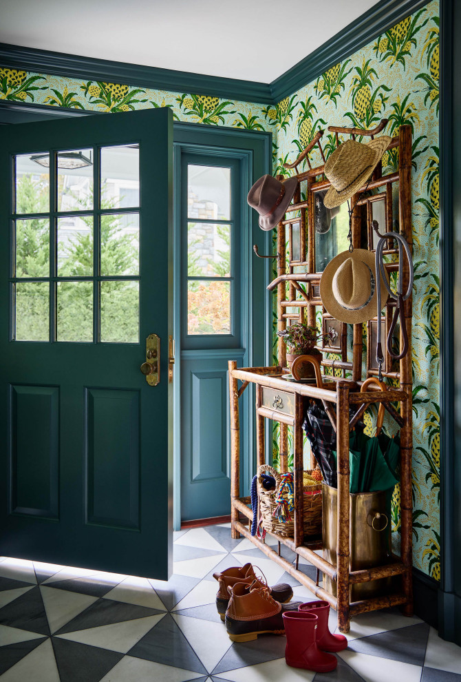 Elegant multicolored floor and wallpaper foyer photo in New York with multicolored walls and a blue front door
