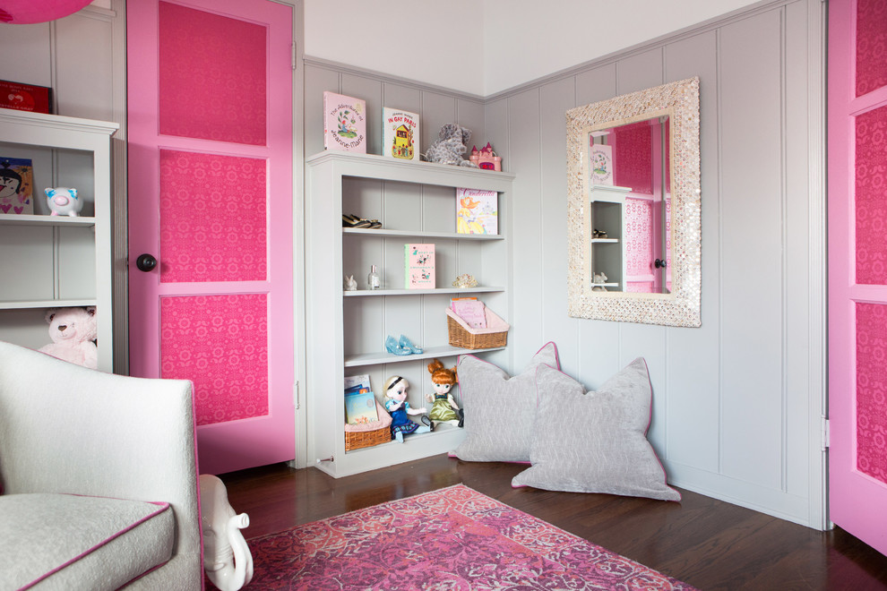 Small transitional kids' bedroom in Los Angeles with grey walls and medium hardwood floors for kids 4-10 years old and girls.