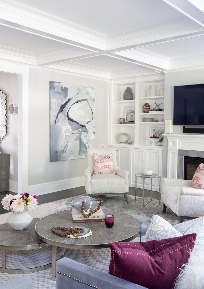 Family room - mid-sized coastal open concept medium tone wood floor and brown floor family room idea in New York with gray walls, a standard fireplace, a wood fireplace surround and a wall-mounted tv