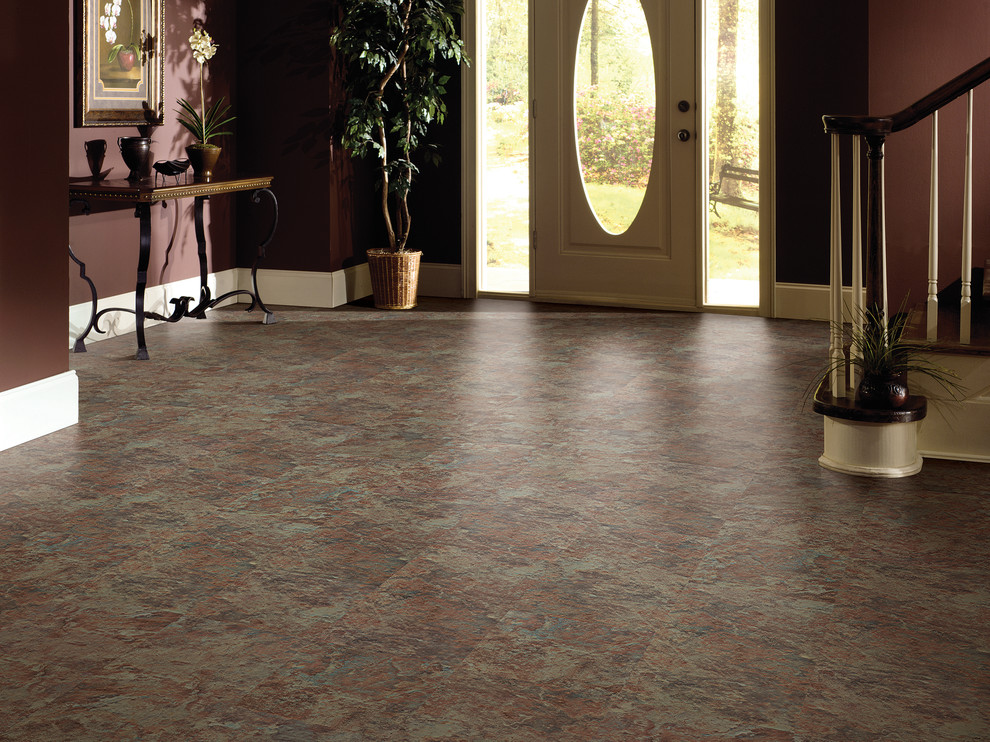 Inspiration for a mid-sized transitional laminate floor foyer remodel with red walls and a white front door