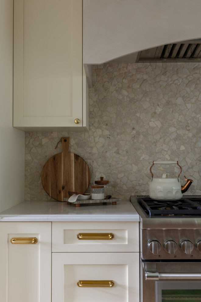 Example of a transitional kitchen design in Seattle