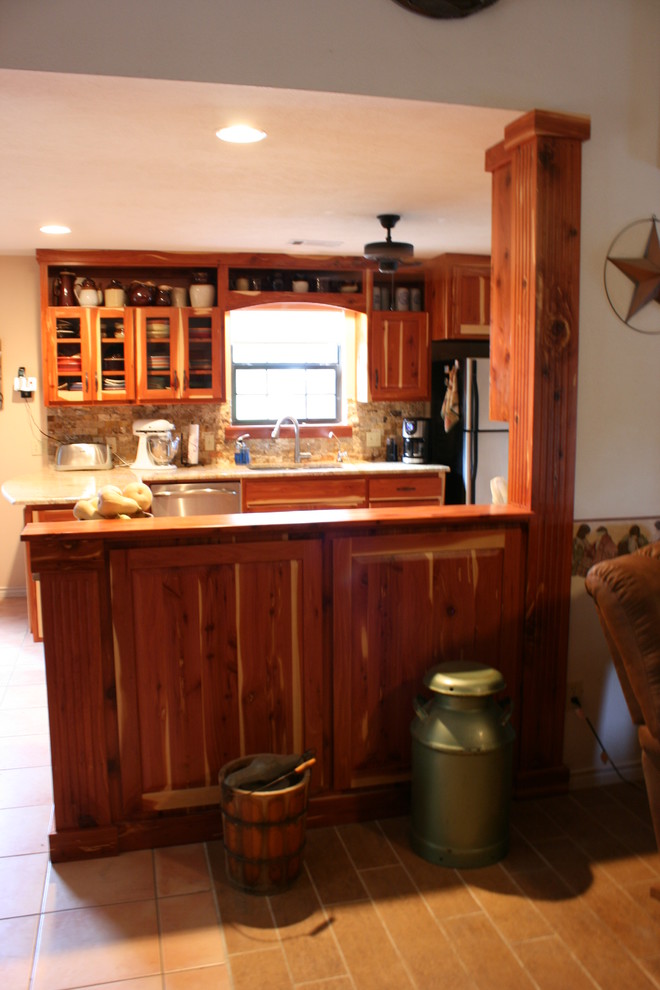 Example of a mountain style kitchen design in Austin
