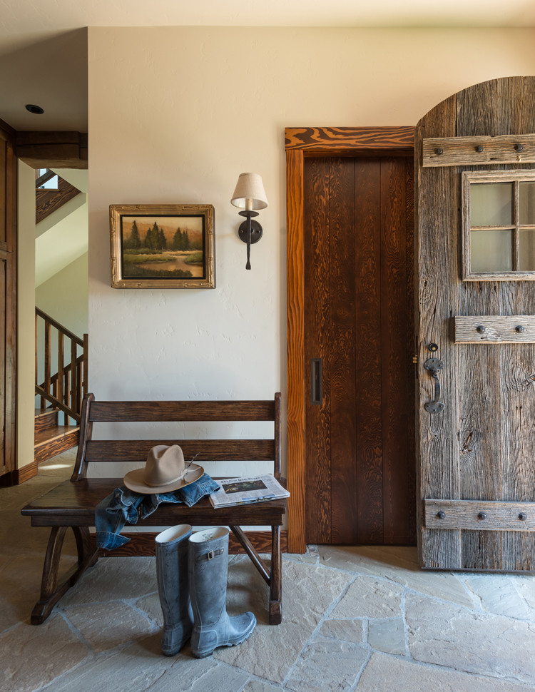 Mountain style entryway photo in Denver