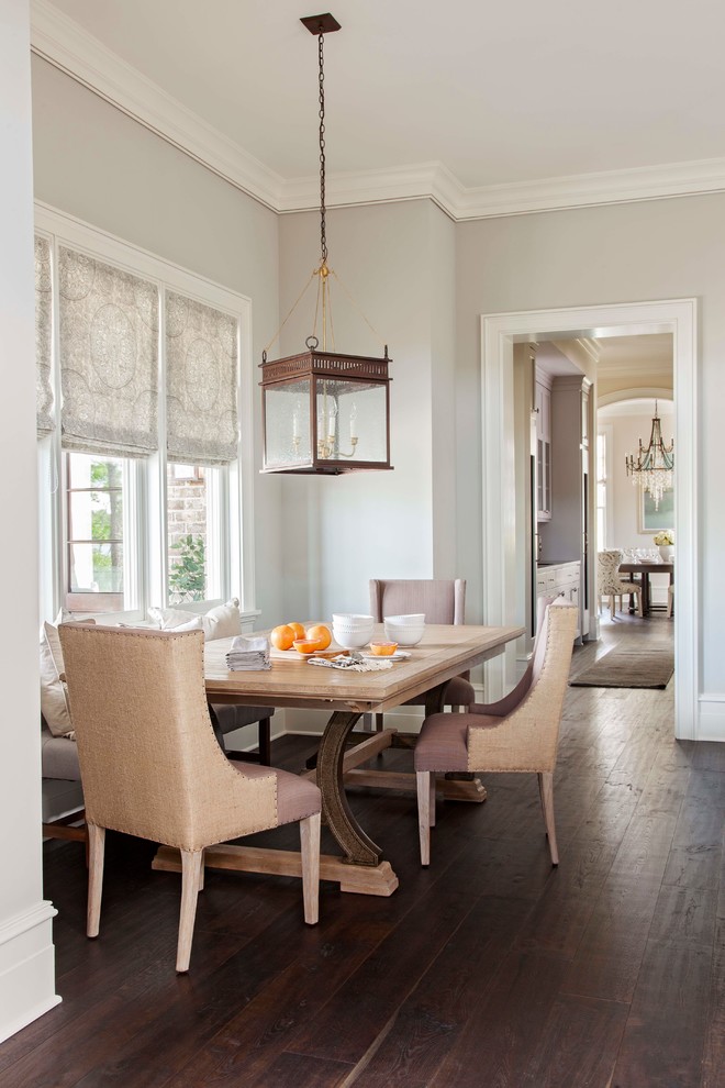 Large transitional kitchen/dining combo in Charleston with dark hardwood floors.