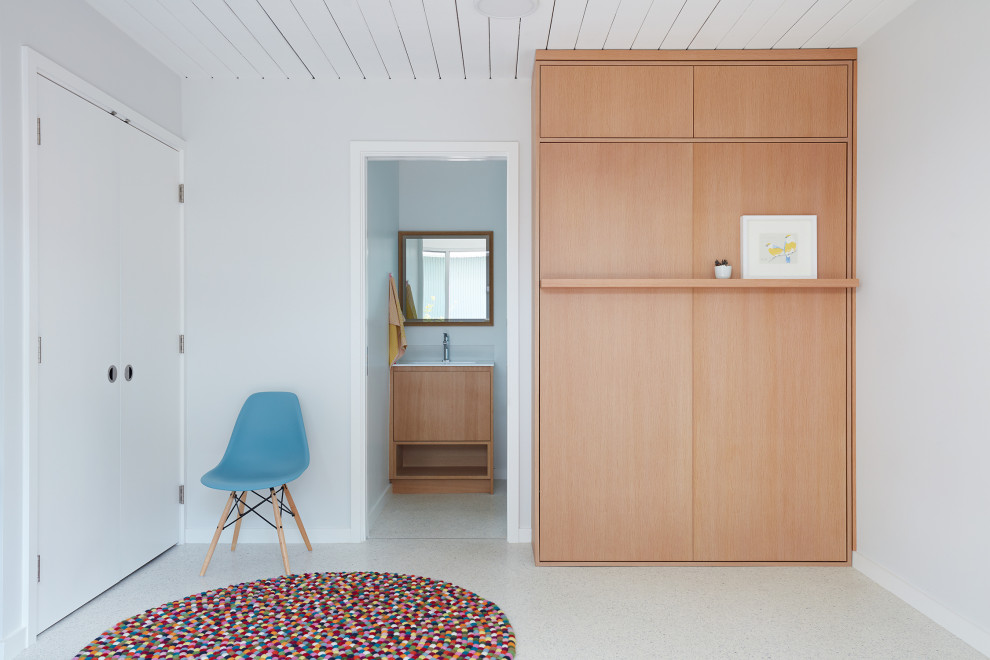 Photo of a midcentury guest bedroom in San Francisco with white walls, white floors and a timber clad ceiling.