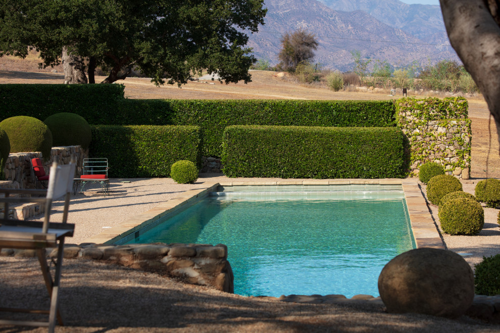 Rural back lengths swimming pool in Santa Barbara with with pool landscaping.