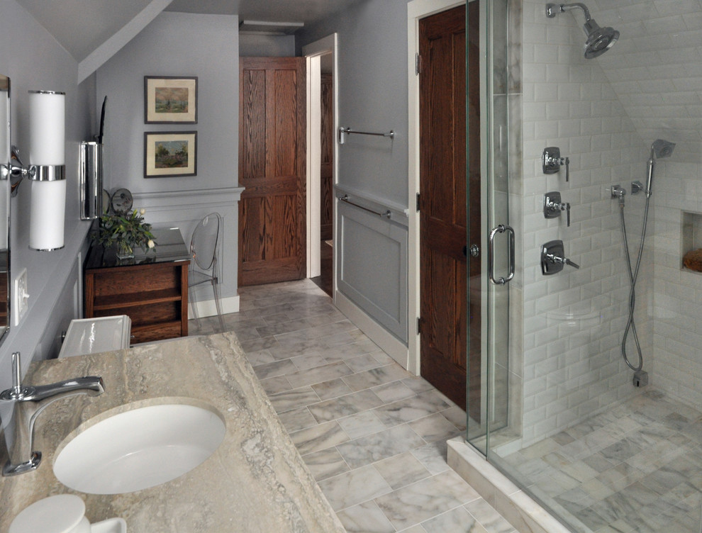 Design ideas for a large transitional bathroom in Chicago with an undermount sink, open cabinets, medium wood cabinets, marble benchtops, a bidet, white tile, stone tile, blue walls, marble floors and an alcove shower.