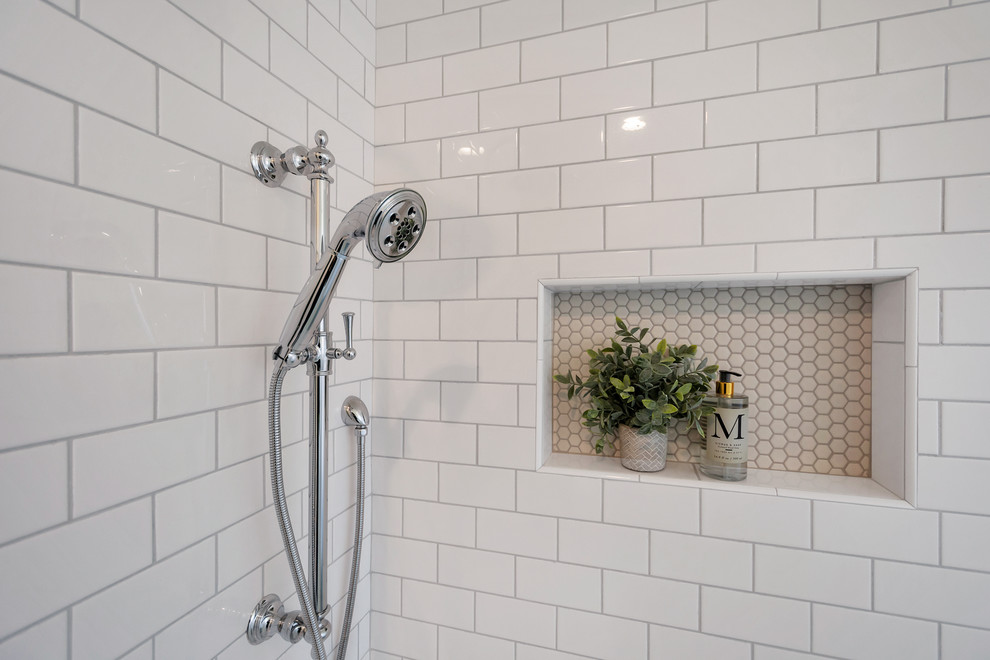 Freestanding bathtub - mid-sized transitional master white tile and subway tile porcelain tile and white floor freestanding bathtub idea in Phoenix with a hinged shower door