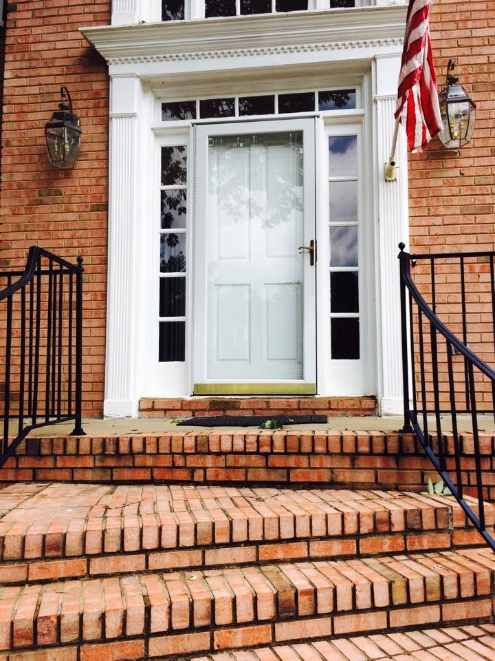 Inspiration for a large transitional front door remodel in Atlanta with a white front door