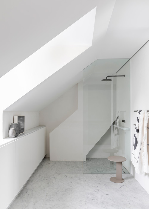 Modern Designed Attic White Bathrooms with Glass Shower Cabins