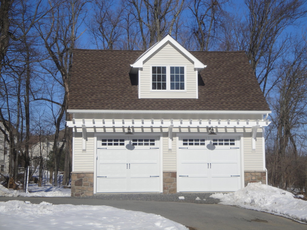 This is an example of a mid-sized traditional detached two-car garage in Philadelphia.