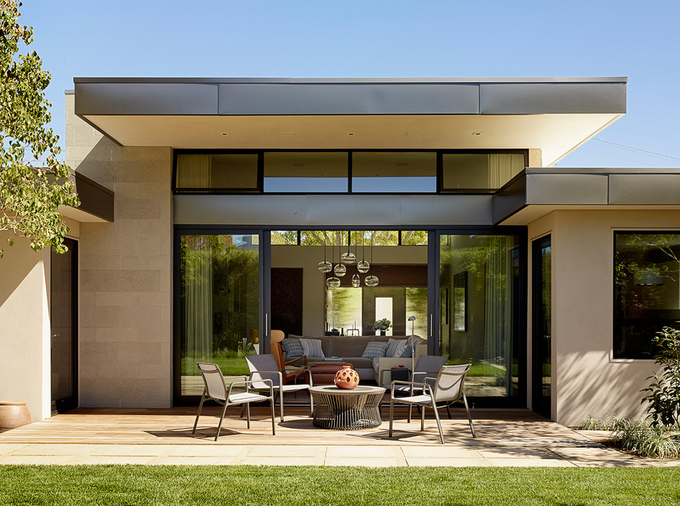 Inspiration for a contemporary patio in San Francisco with a roof extension.