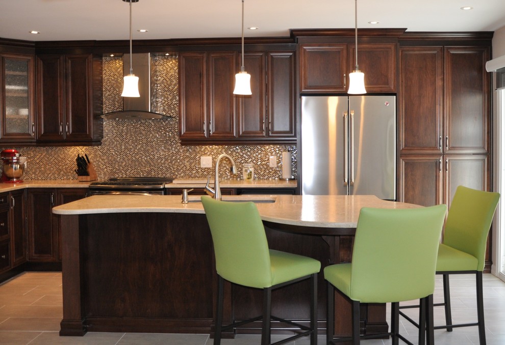 Eat-in kitchen - mid-sized transitional l-shaped ceramic tile eat-in kitchen idea in Ottawa with an undermount sink, recessed-panel cabinets, dark wood cabinets, stainless steel appliances and an island