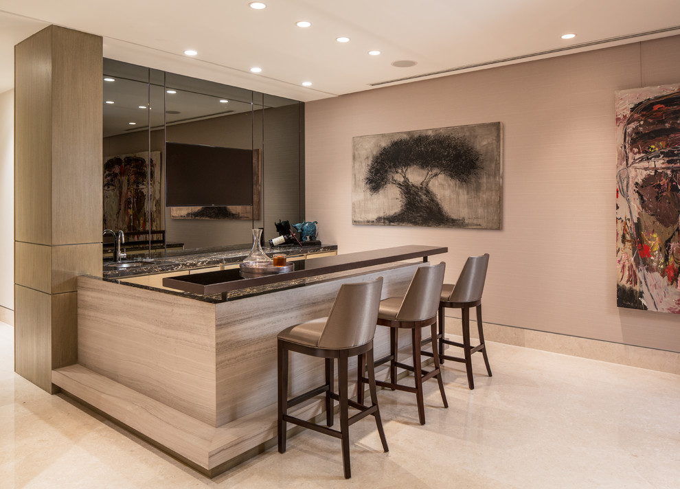 This is an example of a contemporary seated home bar in Other with an undermount sink.